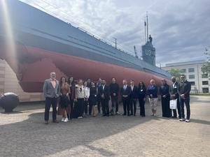 group photo presenters before submarine